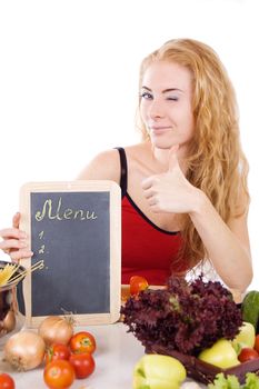 Woman with food ingredients and menu board