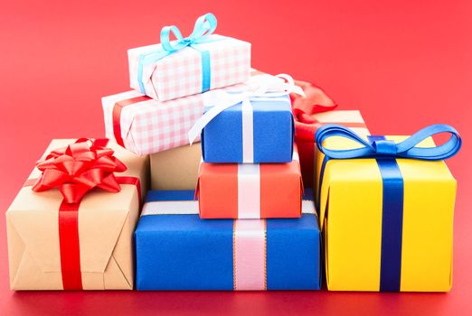 Gift boxes, isolated on red background