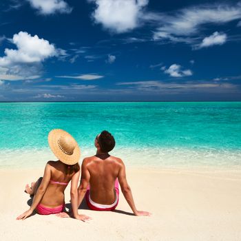 Couple on a tropical beach at Maldives