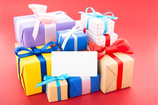 Gift boxes, isolated on red background