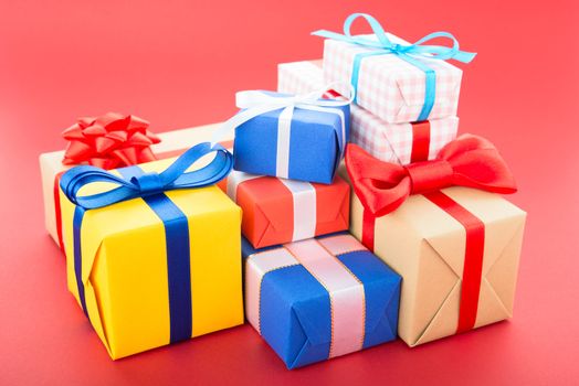 Gift boxes, isolated on red background