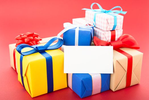 Gift boxes, isolated on red background