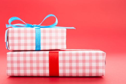 Gift boxes, isolated on red background