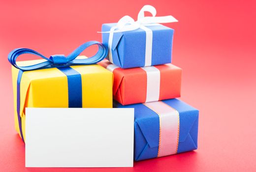 Gift boxes, isolated on red background