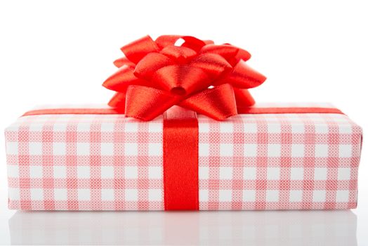 Vintage gift box with red bow, isolated on white background