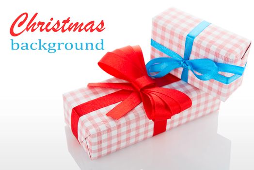 gift boxes with red and blue bows, isolated on white background