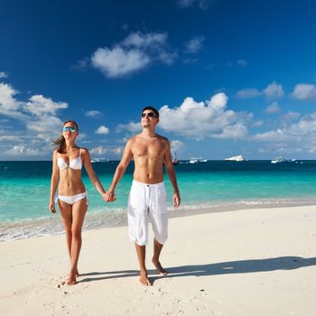 Couple on a tropical beach at Maldives