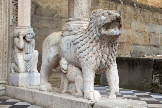 Detail of one of the lions supporting the columns of the right transept porch. Basilica of Santa Maria Maggiore, Bergamo Alta