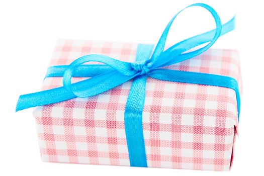 Vintage gift box with blue ribbon, isolated on white background