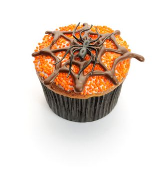 Halloween cupcake with decoration isolated on white