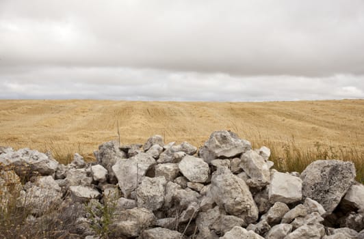 Stonewall in cloudy spanish countryside