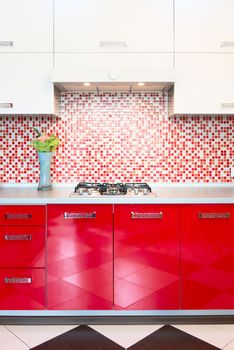 Kitchen red and white. Owen and flowers