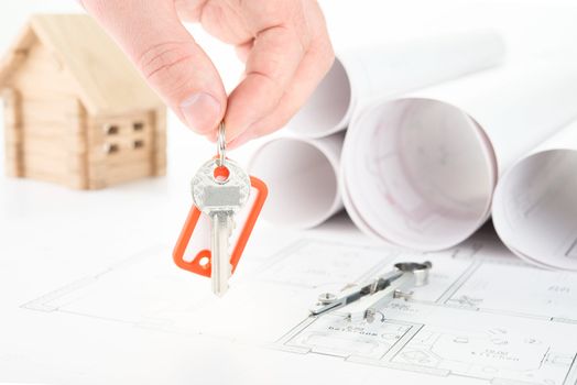 Blueprints hand with keys