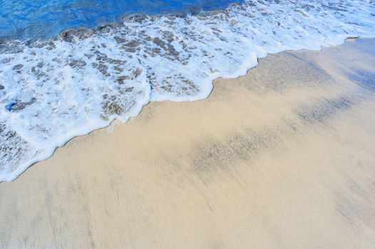 Soft wave of the sea on the sandy beach