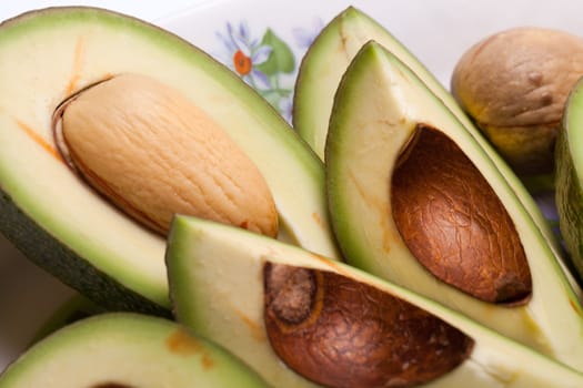 Fresh Avocado Halves On Plate