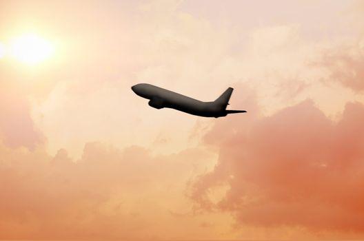 plane takes off into the sky against a background of low sun