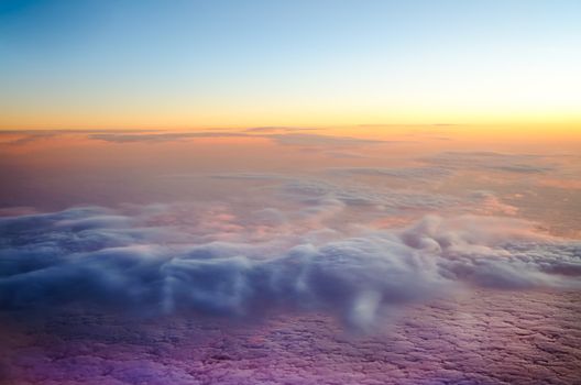 Aerial view of cloud formations on sun set