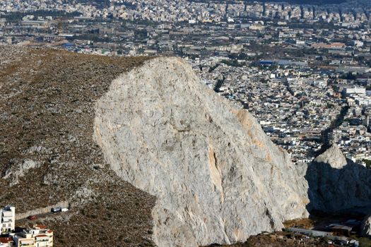 mountain cut with city background in athens greece