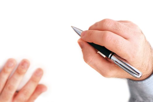 Closeup of businessman's hands on white background holding a pen