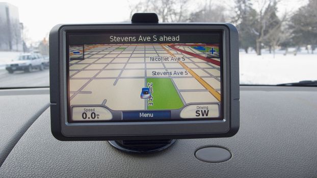 Global Positioning System mounted on car dashboard