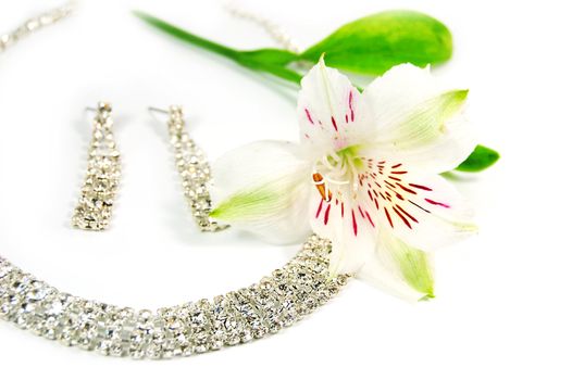 Wedding jewelery, laces, earrings and white flower