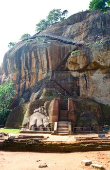 remnants of a stone lion at the entrance and stairs to the palace of the King on Sigiriya ( Lion's rock ) in the central  Sri Lanka