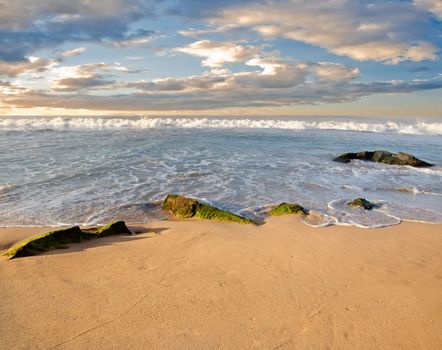 beautiful stones in the waves on ocean coast