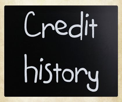 "Credit history" handwritten with white chalk on a blackboard