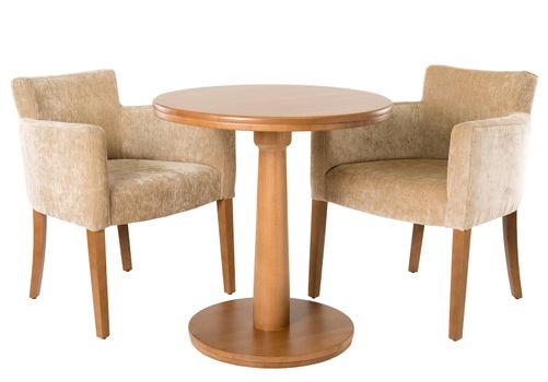 Wooden table and armchairs on white