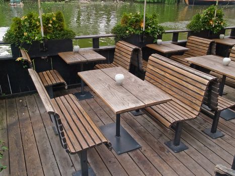 Outdoor restaurant cafe by a lake Tivoli Gardens Copenhagen Denmark