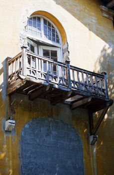 Wooden balcony in a old house