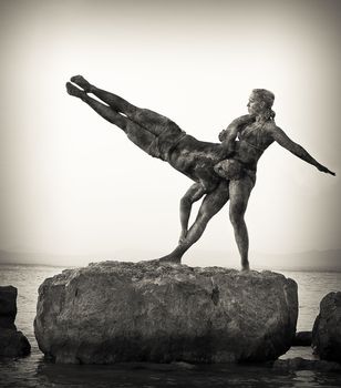 This is a duo of acrobats, with immense power and strength, this rocky texture was applied to create the effect of statue