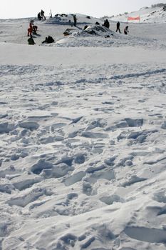 People on Etna covered by snow - Sicily, Italy