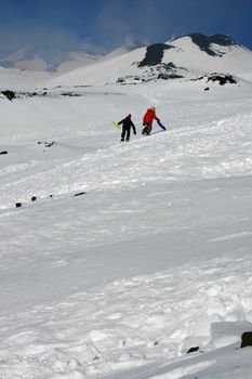 Children playng on snow in Etna Volcano