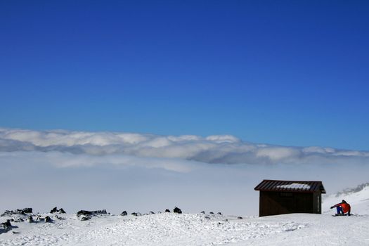 Wooden house on Etna Volcan covered by snow - Italy