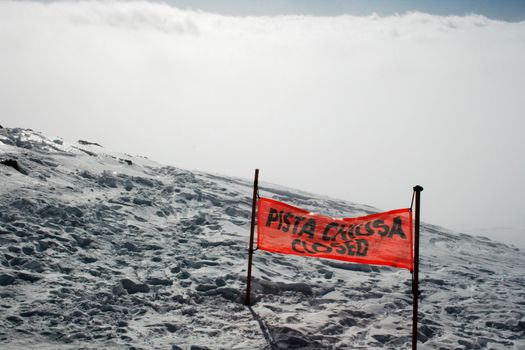 Signal of a closed ski slope in Etna Volcano