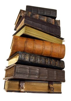 The ancient books in leather reliure on a light background