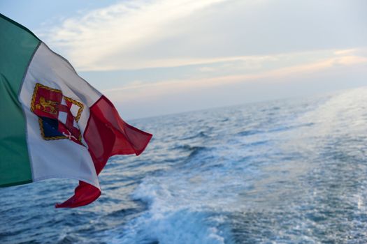 Italian flag on the sea