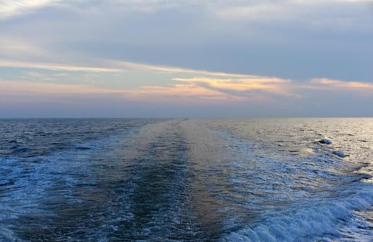 Wawe on the sea at sunset