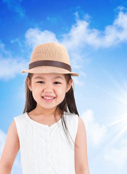 Adorable asian girl wearing hat under hot summer day