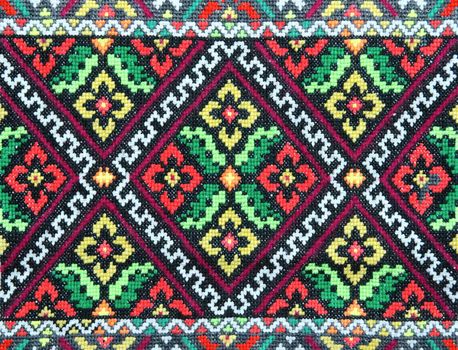 embroidered good by cross-stitch pattern. ukrainian ethnic ornament