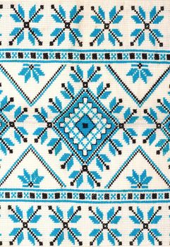 embroidered good by cross-stitch pattern. ukrainian ethnic ornament