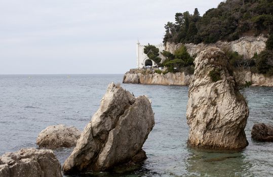 Rock on the sea, Miramare castle. Trieste - Italy