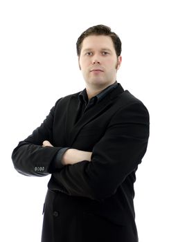 Portrait of a handsome young business man with arms crossed. Isolated on white background with copy space.