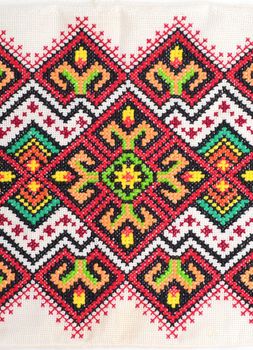 embroidered good by cross-stitch pattern. ukrainian ethnic ornament