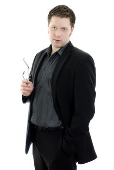 Portrait of a handsome young business man with glasses. Isolated on white background with copy space.