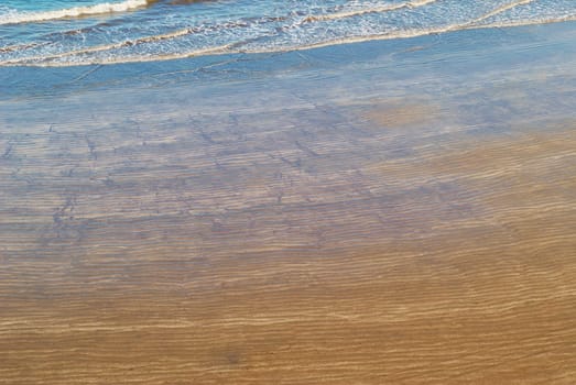 Sandy beach at sunset gold paint Gran Canaria