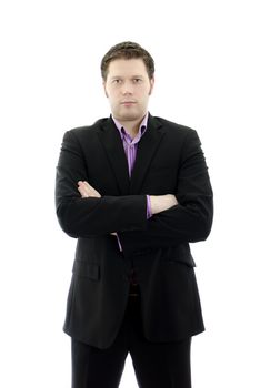 Portrait of a handsome young business man with arms crossed. Isolated on white background with copy space.