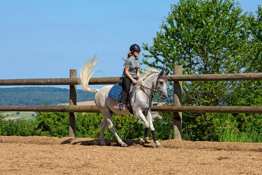 This image shows a portrait from a riding girl