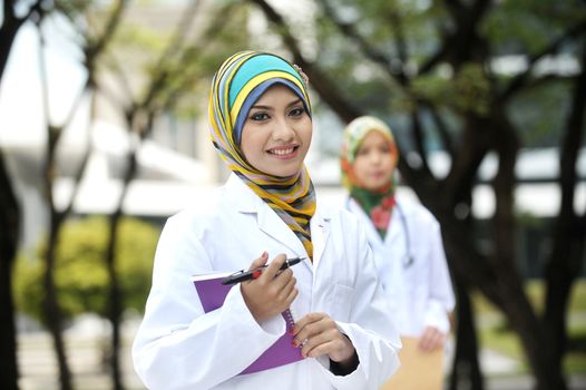 Two Women Doctor With Scarf, Outdoor